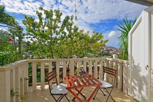 A balcony or terrace at Apartments Mićić