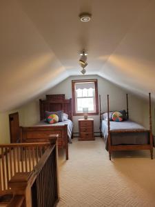 En eller flere senge i et værelse på The ESSEX HOUSE