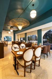 Restorāns vai citas vietas, kur ieturēt maltīti, naktsmītnē Skon Boutique by Orion Hotels