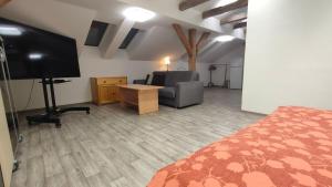 Katil atau katil-katil dalam bilik di Symbiola Apartments