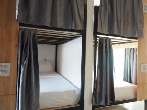 Postelja oz. postelje v sobi nastanitve Activate C3 Hostel