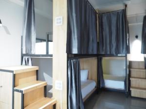 Postelja oz. postelje v sobi nastanitve Activate C3 Hostel