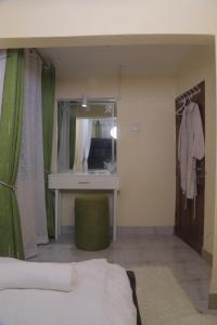 Ein Bett oder Betten in einem Zimmer der Unterkunft Beautiful Spaces 3 bedroomed bungalow