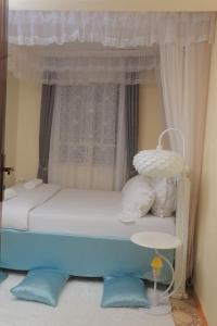 Ein Bett oder Betten in einem Zimmer der Unterkunft Beautiful Spaces 3 bedroomed bungalow