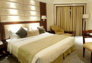 Postel nebo postele na pokoji v ubytování Hotel Star vel
