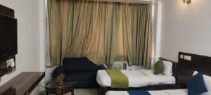 Postel nebo postele na pokoji v ubytování Hotel Star vel