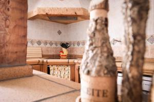 a kitchen with wooden counters and a counter top at Casa Thula - Hello Vejer in Vejer de la Frontera +13 photos