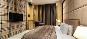 Katil atau katil-katil dalam bilik di Shantis Motel