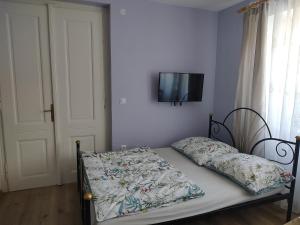 Rúm í herbergi á Hortenzie