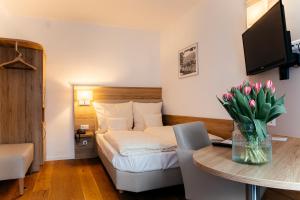 TV a/nebo společenská místnost v ubytování Hotel Perkeo