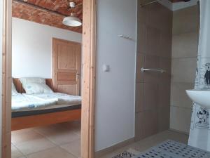 Postel nebo postele na pokoji v ubytování Apartment am Vierkanthof im Thermenland