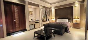 Katil atau katil-katil dalam bilik di Shantis Motel