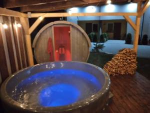 Zdjęcie z galerii obiektu Baltichouse Podczele- domki wakacyjne blisko morza !!! sauna, jacuzzi,grill plac zabaw w Kołobrzegu