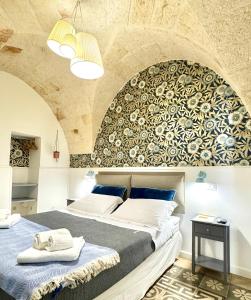 Postel nebo postele na pokoji v ubytování Casa Mida - Guest House