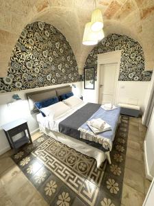 Postel nebo postele na pokoji v ubytování Casa Mida - Guest House