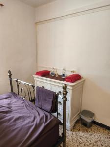 Ένα ή περισσότερα κρεβάτια σε δωμάτιο στο La Robella Casa 32 1 Room Only