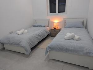 Postel nebo postele na pokoji v ubytování Endor Ground Floor Apartment with backyard and garage in Gozo