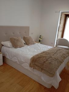 Albergue Turistico En Armenteira A Fragua do Ferreiro客房内的一张或多张床位
