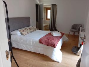 Albergue Turistico En Armenteira A Fragua do Ferreiro客房内的一张或多张床位