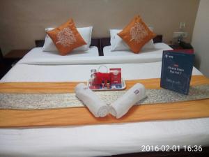 Postel nebo postele na pokoji v ubytování Hotel Mayur