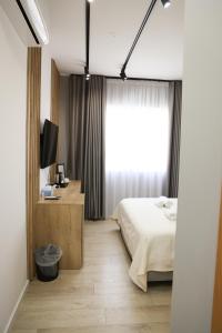 TV a/nebo společenská místnost v ubytování Sol Hotel