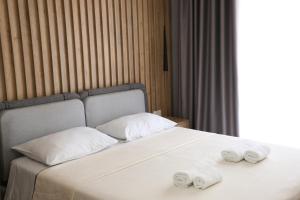 Ліжко або ліжка в номері Sol Hotel