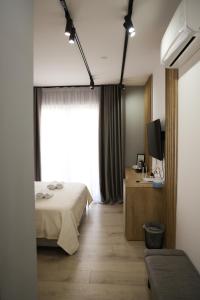 Ліжко або ліжка в номері Sol Hotel
