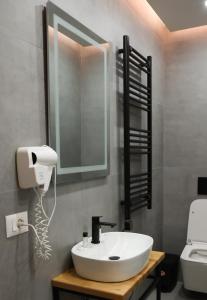 Ванна кімната в Sol Hotel