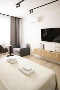 Телевізор і / або розважальний центр в Sol Hotel