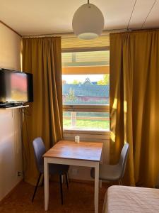 Μια τηλεόραση ή/και κέντρο ψυχαγωγίας στο Bungalow house flat in Rekola 33m2