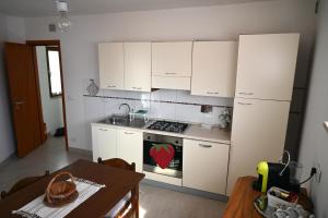 Kuchyň nebo kuchyňský kout v ubytování Borgo Tullio, casa vacanze a pochi passi da Udine