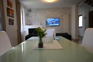 TV a/nebo společenská místnost v ubytování Borgo Tullio, casa vacanze a pochi passi da Udine