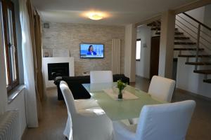 TV a/nebo společenská místnost v ubytování Borgo Tullio, casa vacanze a pochi passi da Udine