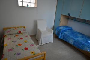 Postel nebo postele na pokoji v ubytování Borgo Tullio, casa vacanze a pochi passi da Udine