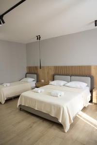 Ліжко або ліжка в номері Sol Hotel