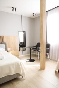 Ліжко або ліжка в номері Sol Hotel