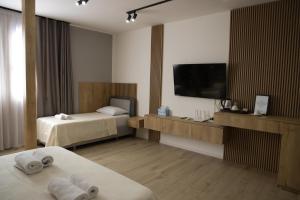Ліжко або ліжка в номері Sol Hotel