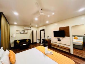 TV o dispositivi per l'intrattenimento presso Shankar Bhavan By Vinayak Hotels