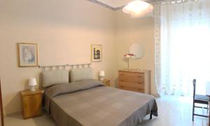 Posteľ alebo postele v izbe v ubytovaní Apartment for 2 in Catania, B&B Le voci del mercato