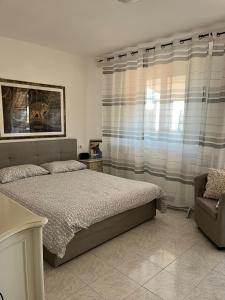 Katil atau katil-katil dalam bilik di Sunrise Apartment