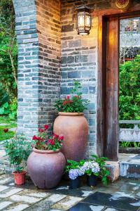 Aed väljaspool majutusasutust Yangshuo FlowerTree Courtyard - Traditional Chinese style