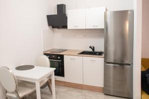Kuchyň nebo kuchyňský kout v ubytování Downtown Zagreb Abode + 16 fotografií