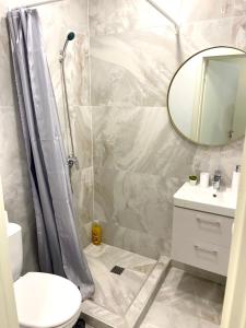 Vonios kambarys apgyvendinimo įstaigoje Seaside apartments 3
