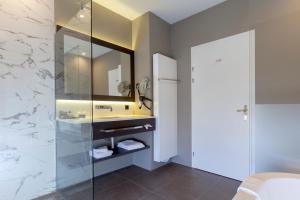 Een badkamer bij Hotel Kasteel Bloemendal