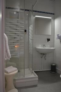 Ванная комната в Brit Hotel Terminus