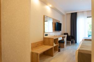 TV a/nebo společenská místnost v ubytování Hotel Sultan Of Side