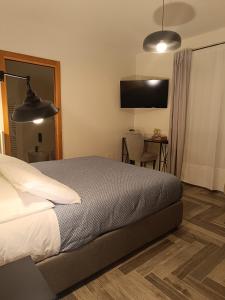 Letto o letti in una camera di Il Rifugio del Borgo