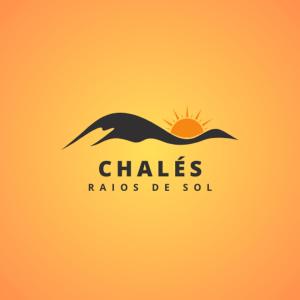 a dolphin swimming in the ocean with the sun behind it at Chalés Raios de Sol in Monte Verde