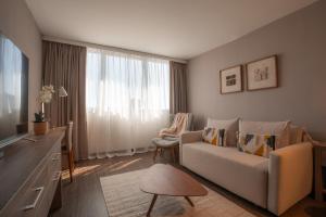TV a/nebo společenská místnost v ubytování Frontier Hotel Rivera
