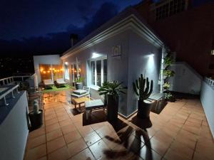 Ein Balkon oder eine Terrasse in der Unterkunft La Casita del Arco Ático